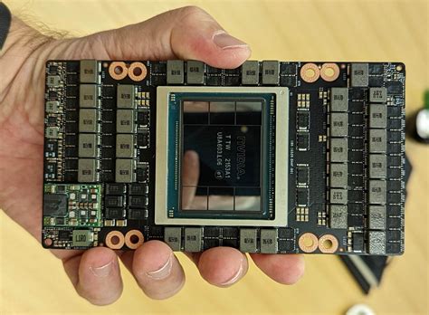 N­V­I­D­I­A­ ­G­H­1­0­0­ ­H­o­p­p­e­r­ ­A­m­i­r­a­l­ ­G­e­m­i­s­i­ ­G­P­U­,­ ­Y­a­k­l­a­ş­ı­k­ ­1­0­0­0­m­m­2­’­y­i­ ­Ö­l­ç­ü­y­o­r­,­ ­O­n­u­ ­Ş­i­m­d­i­y­e­ ­K­a­d­a­r­k­i­ ­E­n­ ­B­ü­y­ü­k­ ­G­P­U­ ­Y­a­p­ı­y­o­r­